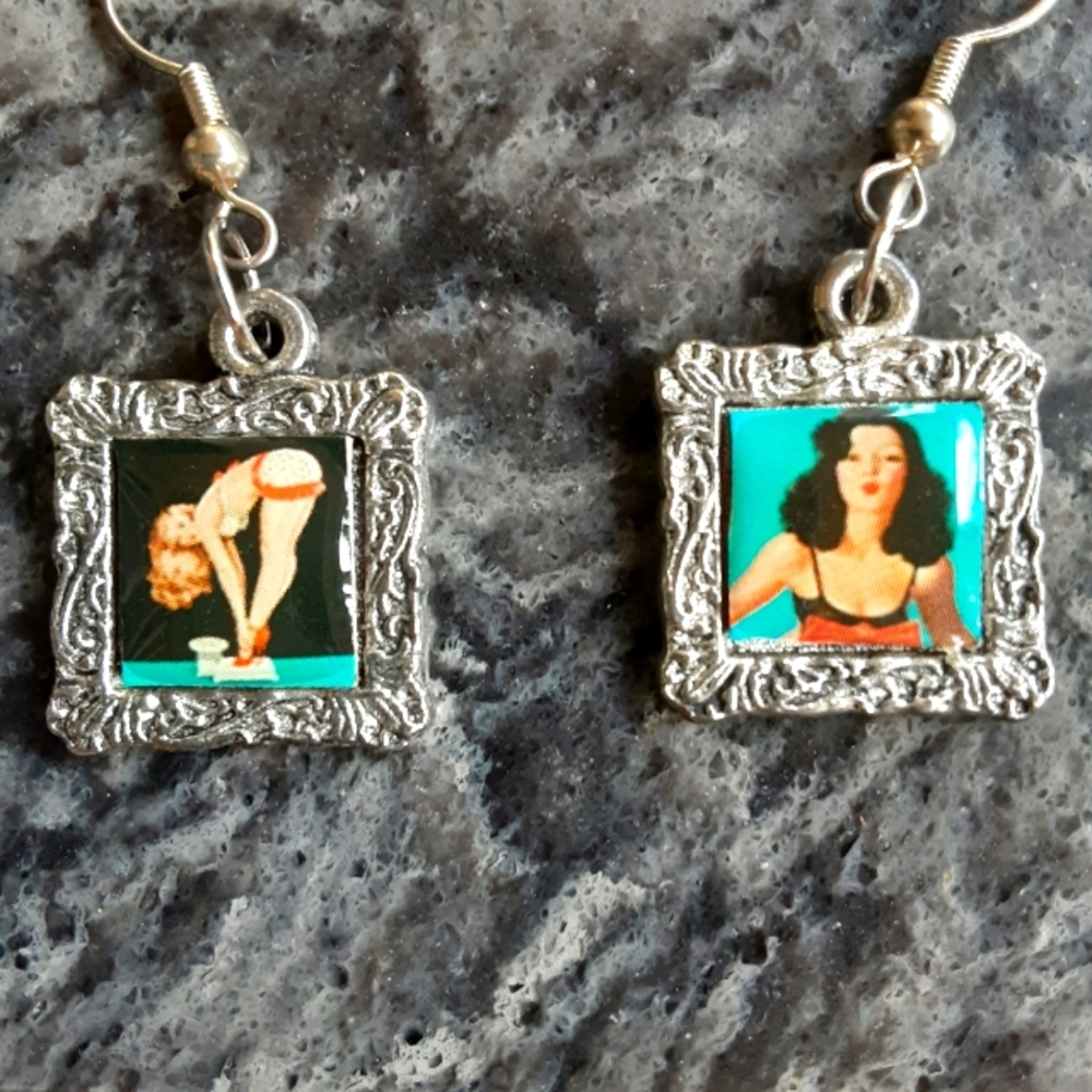 Pinup girl earrings in silver tone finish